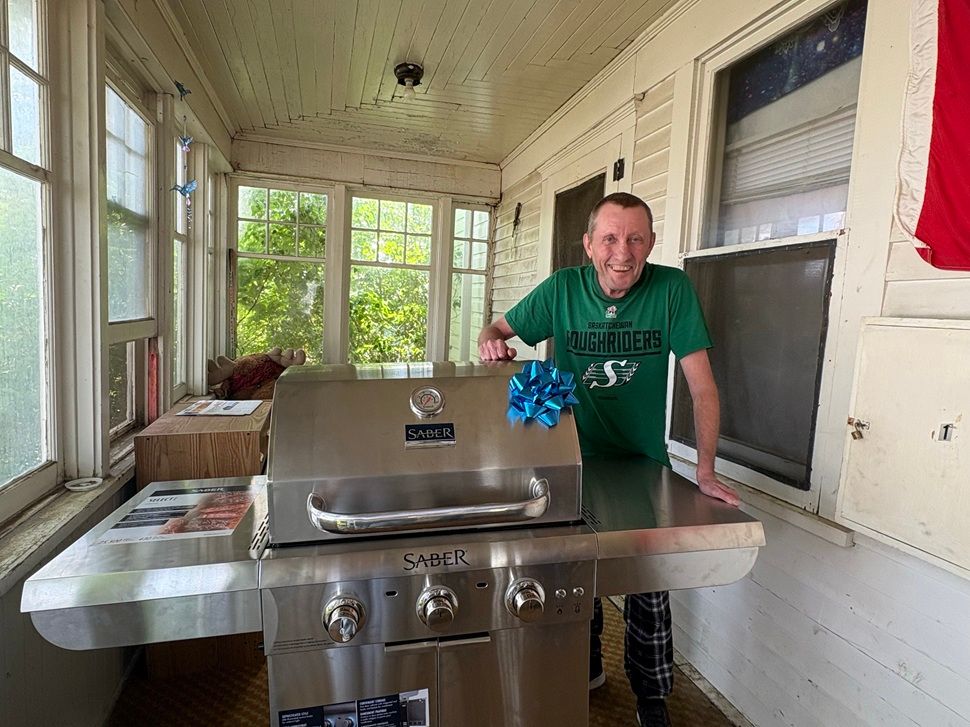 Mike Slate, local listener and winner of the Hot Dog Day barbecue! (photo by Violet Saretsky)